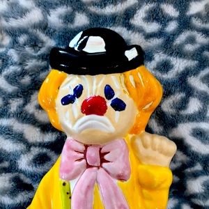 Ceramic, Clown 🤡, one side is a happy face. The other is a sad face.